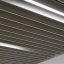 Rockfon® Intaline™ Round Base Metal Baffle Ceilings